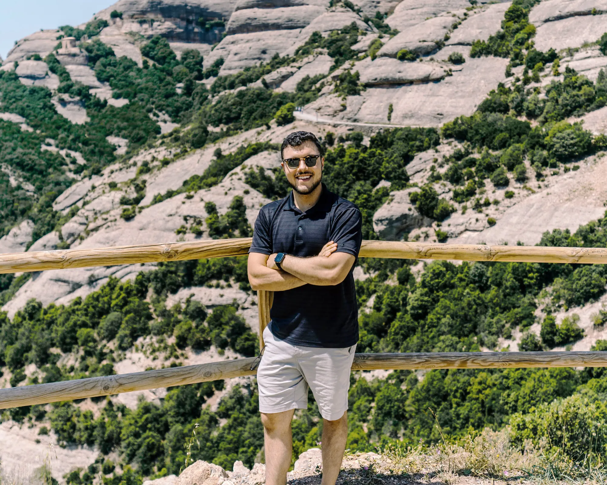 Pablo standing at a mountain overlook in Catalonia